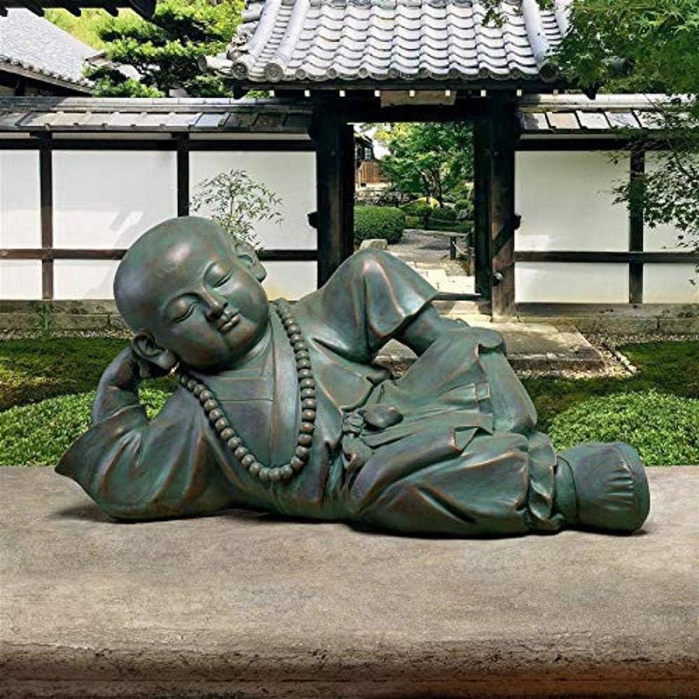 imageDesign Toscano Resting Serene Baby Monk Asian Boy Garden Statue 24 inches Wide 12 inches Tall Cast Stone Resin Green Bronze FinishResting Serene Baby Buddha